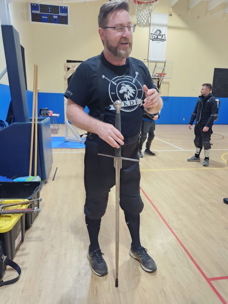 Jake Priddy holding feder sword